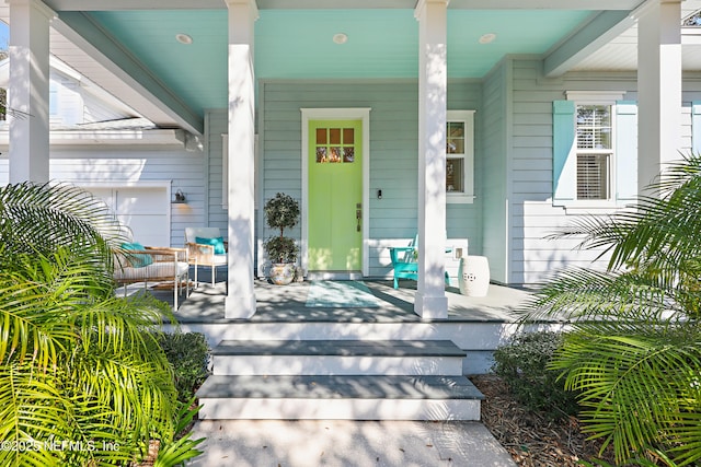 doorway to property with a porch