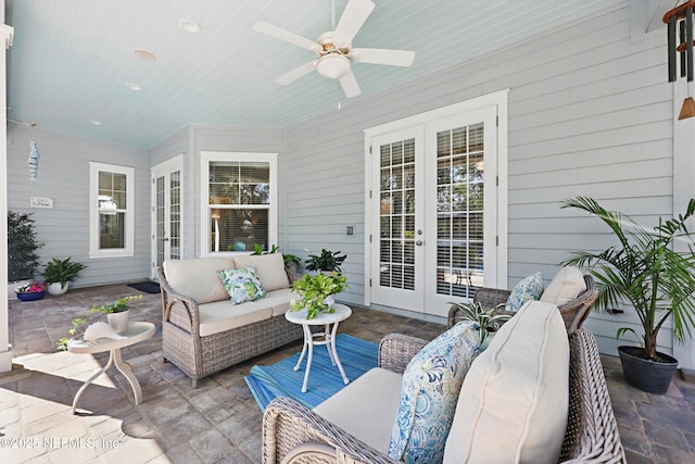 view of patio featuring a ceiling fan, french doors, and outdoor lounge area