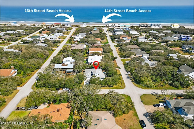 aerial view featuring a water view and a residential view