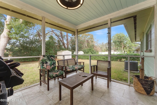 sunroom with wood ceiling