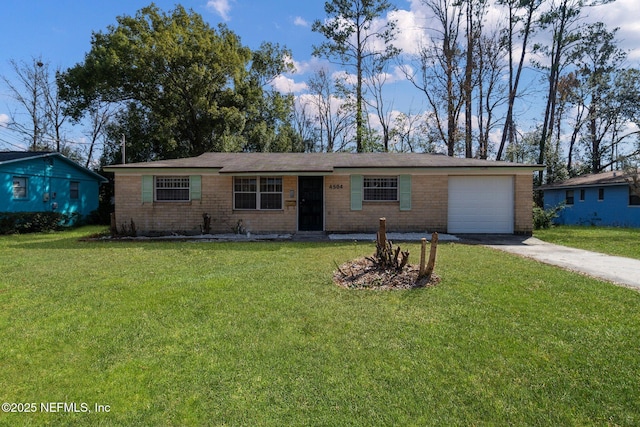 ranch-style home with a garage and a front lawn