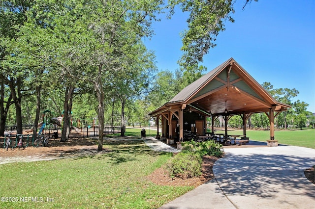 view of property's community featuring a gazebo and a lawn