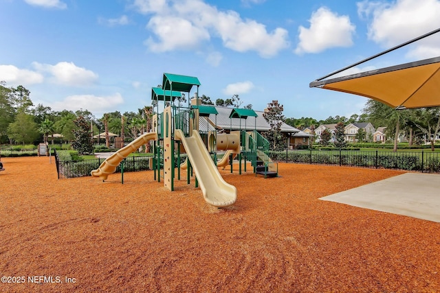 community jungle gym with fence