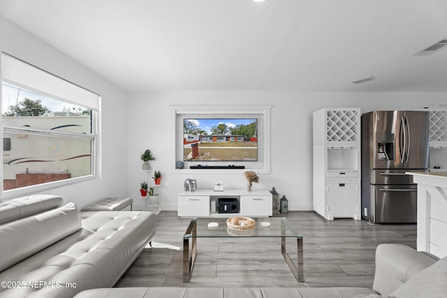 living room with hardwood / wood-style floors