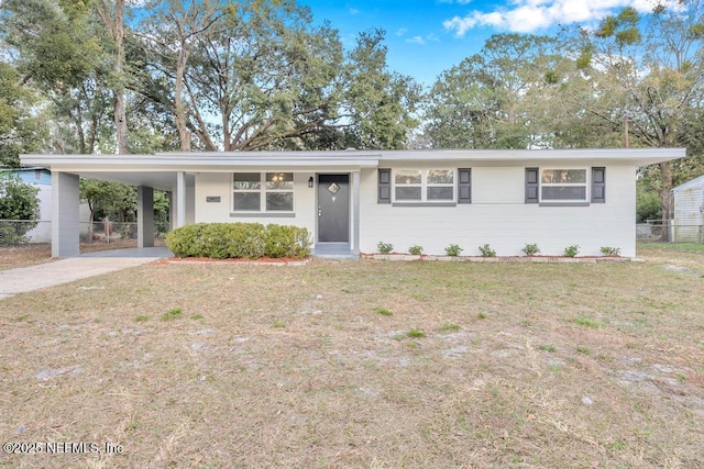 single story home with a carport and a front yard