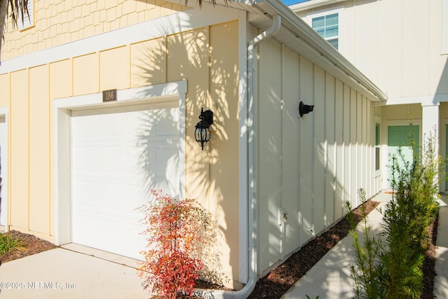 view of side of property featuring a garage