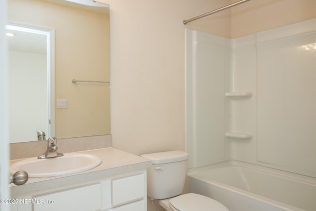 full bathroom featuring shower / tub combination, vanity, and toilet