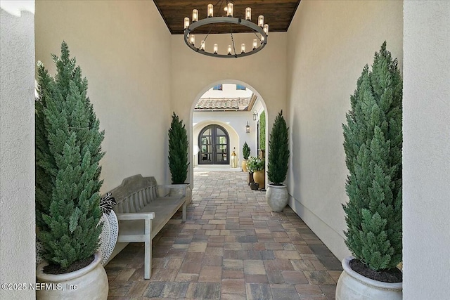 property entrance featuring french doors