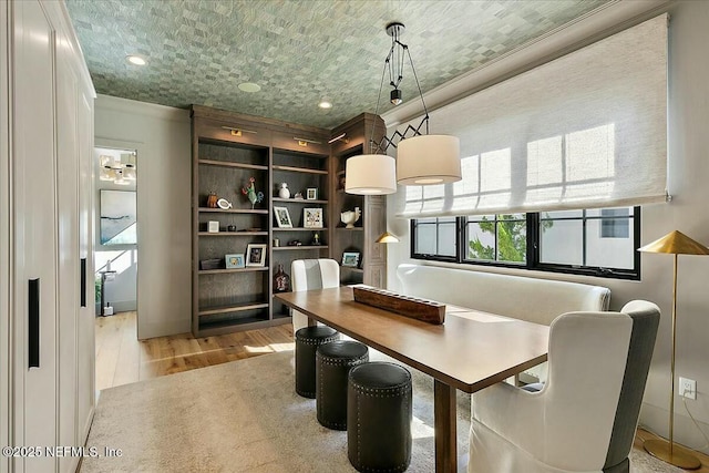 dining space featuring light hardwood / wood-style flooring