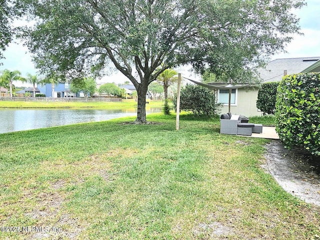 view of yard with a water view