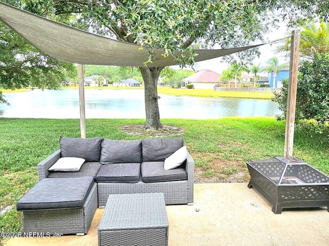 view of patio with a water view