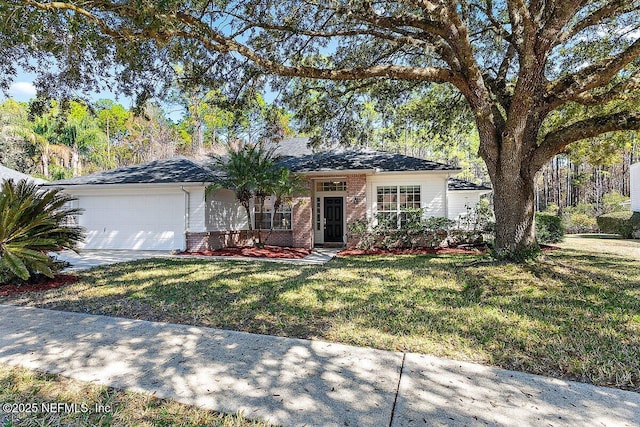 ranch-style house featuring a garage and a front lawn