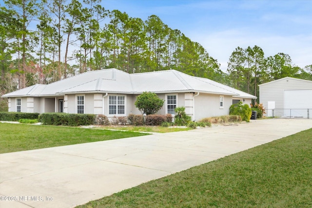 ranch-style home with a front lawn