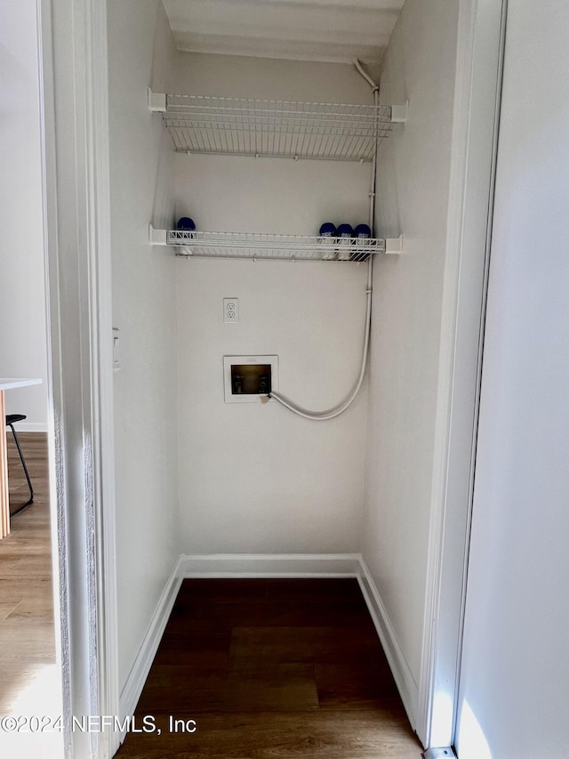 clothes washing area with hookup for a washing machine and hardwood / wood-style floors