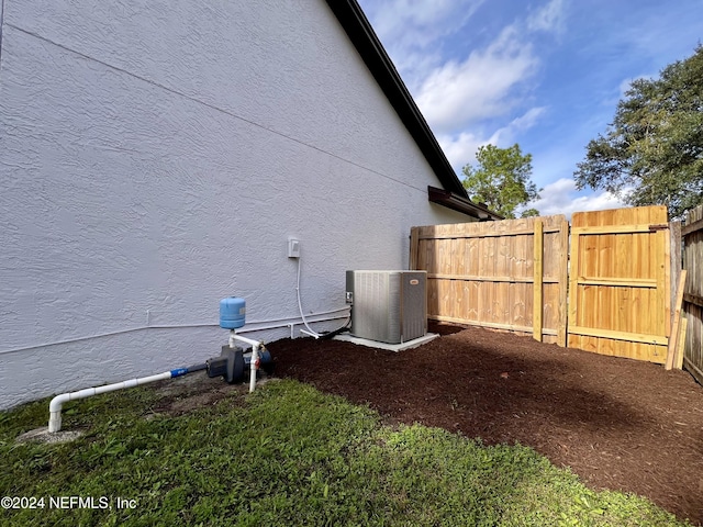 view of property exterior featuring central air condition unit