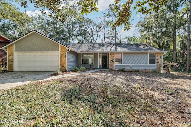 single story home featuring a garage