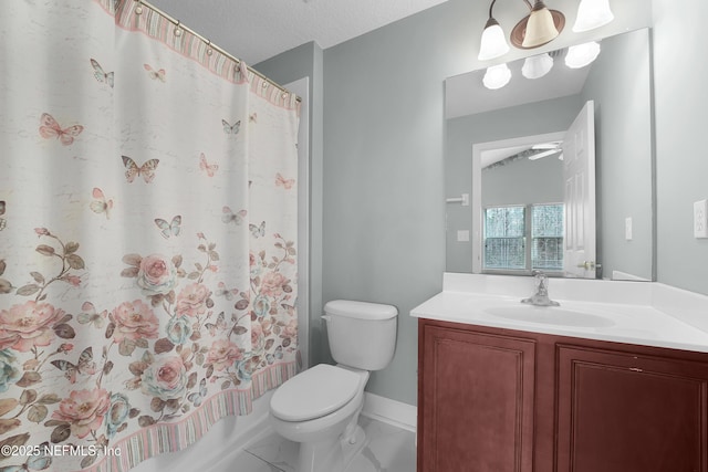 full bathroom featuring shower / bathtub combination with curtain, vanity, toilet, and a textured ceiling