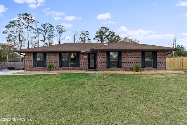 ranch-style house with a front yard