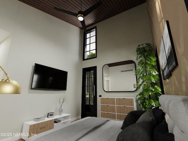 living room with wood ceiling and a towering ceiling