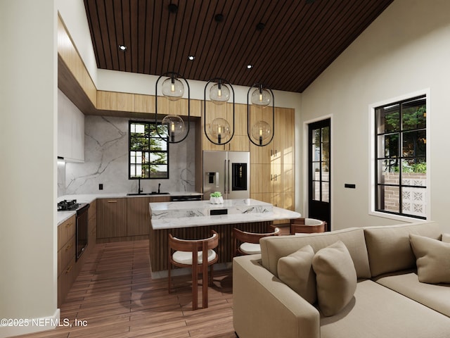 kitchen with range, hanging light fixtures, wooden ceiling, stainless steel fridge, and backsplash