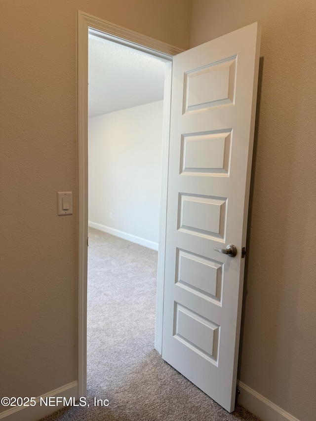 8284 Helmsley Blvd, Jacksonville, FL 32219 - hall featuring baseboards and carpet