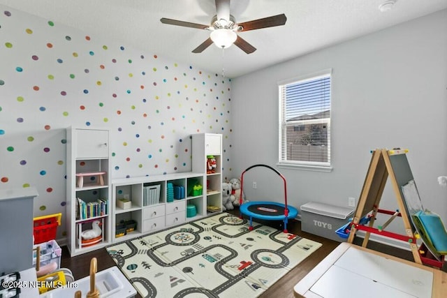 playroom featuring ceiling fan