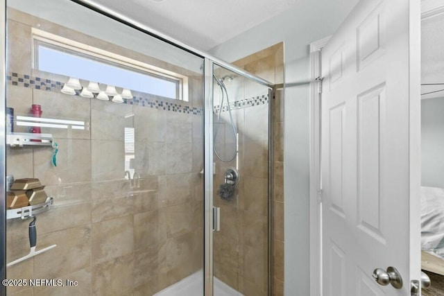 bathroom featuring an enclosed shower