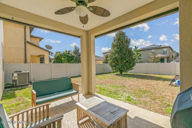 exterior space with central AC, ceiling fan, and a patio area