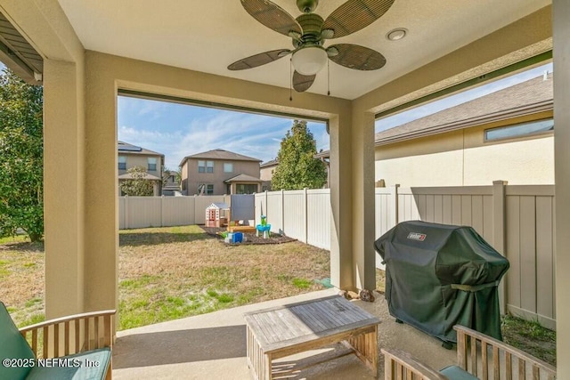 sunroom / solarium with ceiling fan