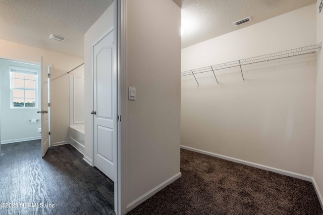 interior space with dark wood-type flooring