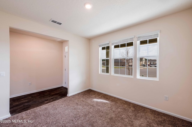 view of carpeted spare room