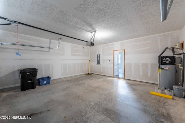 garage with a garage door opener and electric panel