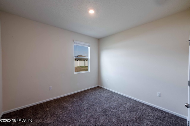 unfurnished room featuring carpet floors