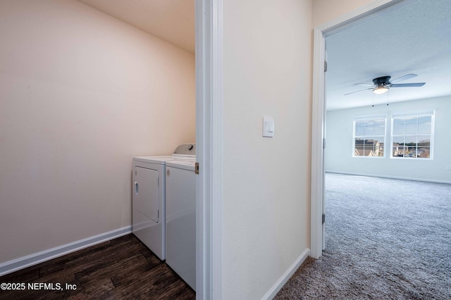 laundry area with ceiling fan, washing machine and clothes dryer, and dark colored carpet