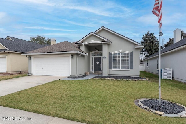 single story home with a garage and a front lawn