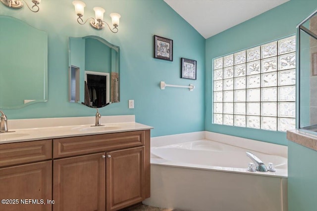 bathroom featuring vanity, lofted ceiling, and plus walk in shower