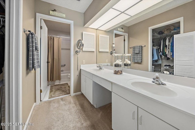 full bathroom with shower / tub combo with curtain, vanity, and toilet