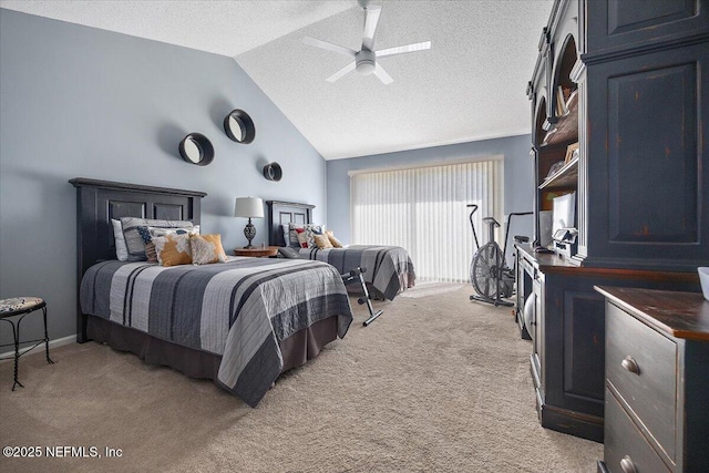 carpeted bedroom with ceiling fan, vaulted ceiling, and a textured ceiling