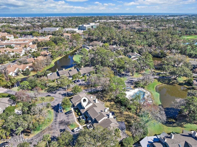 drone / aerial view with a water view