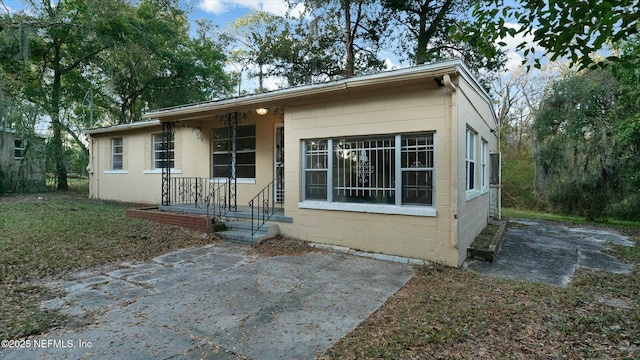 view of front of property with a patio area