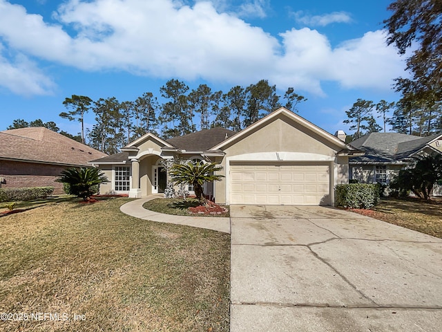 single story home featuring a garage and a front lawn