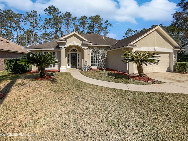 single story home with a garage and a front yard