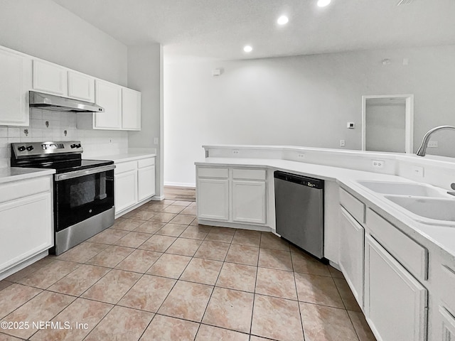 kitchen with sink, stainless steel appliances, and white cabinets