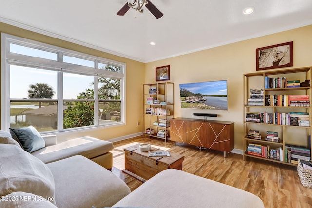 94202 Christopher Ln, Fernandina Beach, FL 32034 - living room featuring wood-type flooring, ceiling fan, and crown molding