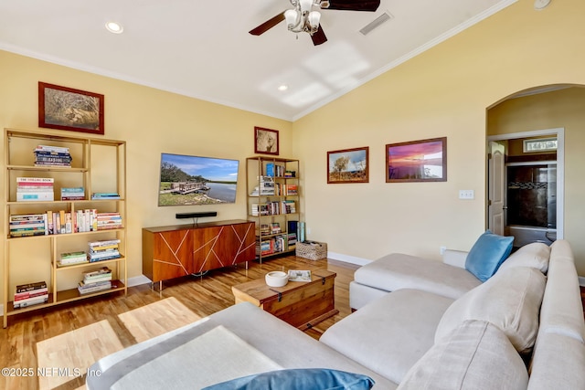 94202 Christopher Ln, Fernandina Beach, FL 32034 - living room featuring crown molding, ceiling fan, lofted ceiling, and light hardwood / wood-style flooring