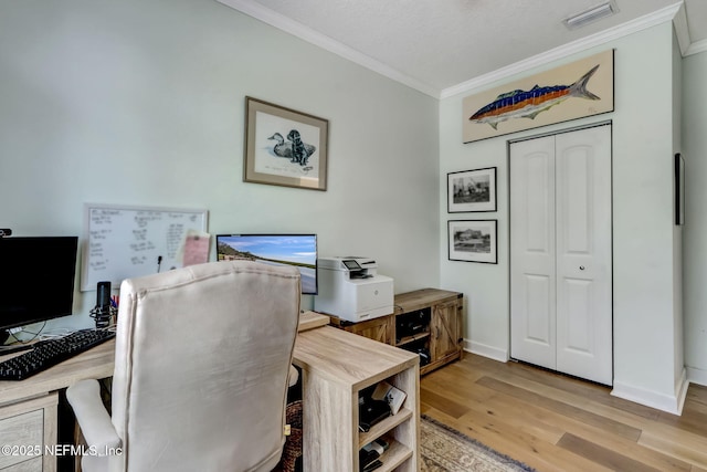 94202 Christopher Ln, Fernandina Beach, FL 32034 - home office featuring ornamental molding and light hardwood / wood-style floors