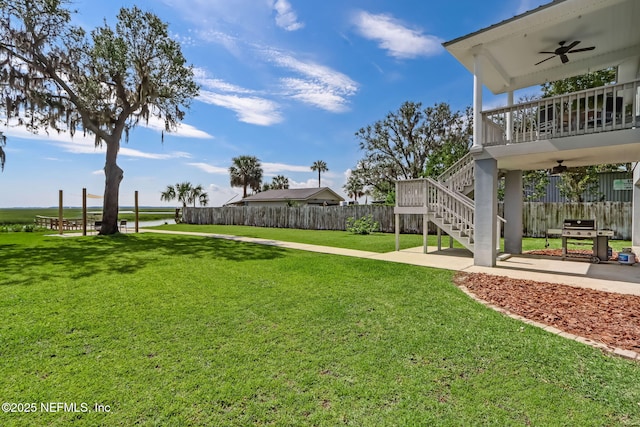 94202 Christopher Ln, Fernandina Beach, FL 32034 - view of yard featuring a patio and ceiling fan