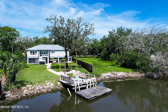 94202 Christopher Ln, Fernandina Beach, FL 32034 - view of dock featuring a lawn, a balcony, and a water view