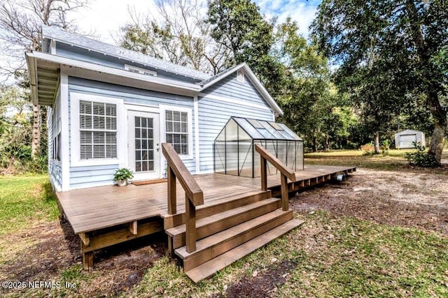 deck featuring an outbuilding