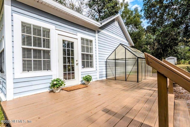 deck with an outdoor structure